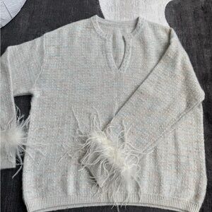 Elegant sparkly cashmere Sweater with ostrich Feather Accents
